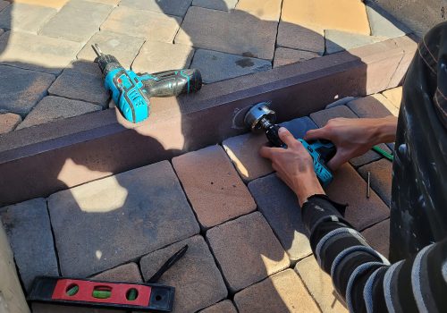 drilling-a-concrete-curb-to-install-the-luminaire-2026-01-08-07-45-49-utc (1)