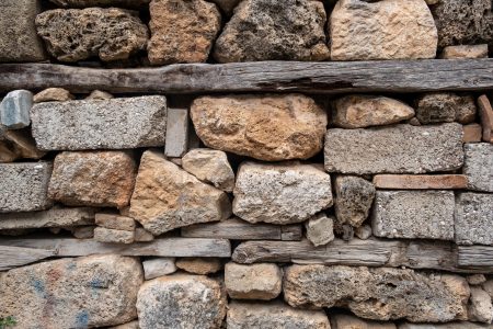 Texture of a stone wall. Old castle stone wall texture background. Stone wall as a background or texture. Part of a stone wall, for background or texture